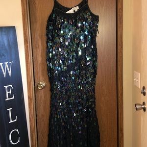 Worn once and it is too pretty of a dress to just sit in my closet